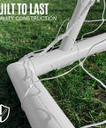 Corner detail of Q Fold Soccer Goal Easy Setup Backyard All Weather 72 By 48 By 24 Inches, showing netting and ground construction.