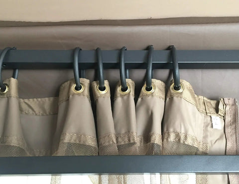 Universal 10x10 Gazebo Mosquito Netting Replacement Tan, netting only with tan fabric trim on black rod, plastic clip rings visible