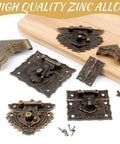 Top Shelf Antique Brass Jewelry Box Hardware Set Featuring Ornate Latches Rock Solid Hinges Rustic Carry Handle Premium Mounting Screws laid out on a wooden surface.