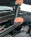Person using Big Fifteen Point Five Quart Oil Drain Pan With Easy Pour Spout And 18 Inch Mechanics Funnel Kit For Auto Fluids