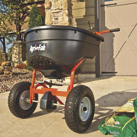 Push Broadcast Spreader 130 Lb Hopper Capacity Easy To Use Direct Rod Control 10 To 12 Ft Spread Width 13 Inch Pneumatic Tires