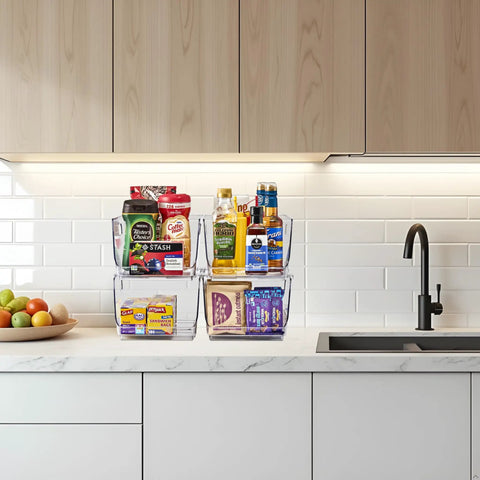 Stackable Open Front Storage Bins For Kitchen And Pantry Organization Clear Pantry Organizer Bins Medium Set Of Four Easy Grab Bins For Fridge Cabinets And Shelves displayed on a countertop filled with kitchen items.