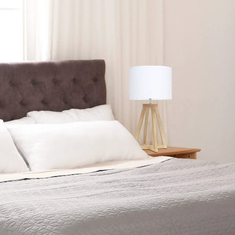 Interlocked Triangular Natural Wood Table Lamp with White Fabric Shade on Cord Easy Switch Sleek Modern Desk Light next to bed