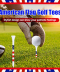 Three And One Quarter Inch Wooden Golf Tees With Stars And Stripes Colors Built Tough For 100 Count Durable Wood in use on golf course