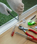 Hands installing Heavy Duty Double Bearing Sliding Door Roller Featuring Silky Smooth Glide Pulleys And Standard 8mm Screw Mounting Holes.