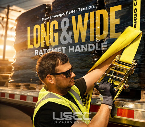 Man using Replacement Fixed Ends For Ratchet Straps 4 Inch By 11 Inch 2 Pack Tough As Nails 5400 Lbs on flatbed trailer