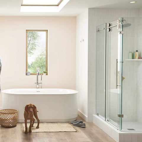 Modern bathroom with Studio S Shower Trim Kit, one-piece ceramic cartridge, polished chrome finish, and glass shower enclosure.