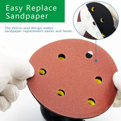 Hands holding sandpaper for Dual Action Pneumatic Sander With Vacuum Extraction, 5 Inch And 6 Inch Pads self vacuum dust removal.
