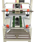 Versatile Case Sealer And Adjustable Top And Bottom Tape Dispenser Zero Stress Smooth Operator For Custom Shipping Boxes on a dual belt conveyor system.