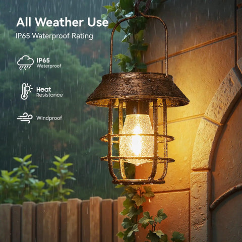 Two Pack Solar Lanterns Outdoor Waterproof Hanging Lights With Wall Hooks Retro Metal Lanterns in rain showing weatherproof design