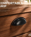 Slick Oil Rubbed Bronze Cup Pulls For Kitchen Cabinets And Drawers 3 Inch Hole Centers 15 Pack visible on wooden drawer.