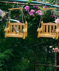 Set Of 2 Wooden Swing Bird Feeders For Outdoor Hangin With Metal Mesh Bottom, Bench Style Bird Feeders in a garden setting