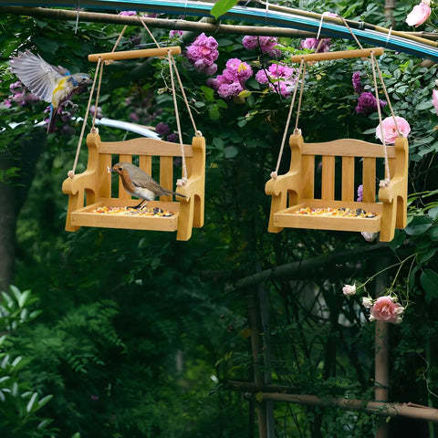 Set Of 2 Wooden Swing Bird Feeders For Outdoor Hangin With Metal Mesh Bottom, Bench Style Bird Feeders in a garden setting