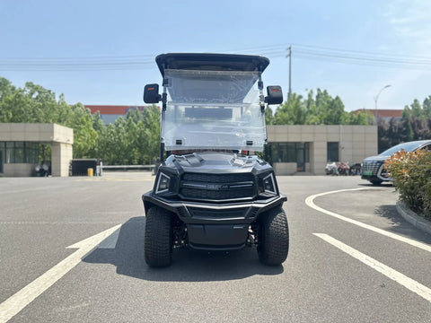 Premium Four Seater Electric Golf Cart Delivers Smooth All Terrain Ride Perfect For Weekend Warriors And Community Cruising with black exterior and windshield.