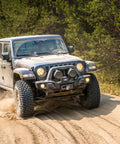 Off-road 4x4 truck equipped with premium synthetic winch rope three eighths inch by one hundred feet, 23800 lbs break strength.