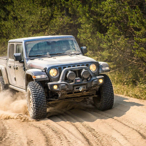Off-road 4x4 truck equipped with premium synthetic winch rope three eighths inch by one hundred feet, 23800 lbs break strength.