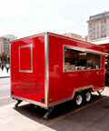 Turnkey Commercial Food Truck Trailer Ready To Roll Fully Loaded Mobile Kitchen Setup with red exterior and large service window for street vending.