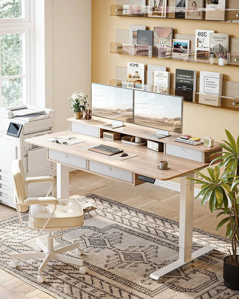 Fezibo 60 By 30 Inch Electric Standing Desk With Drawers Light Rustic Brown Finish in home office setting with dual monitors and a chair.