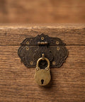 Antique Style Jewelry Box Hardware Kit with hinges and padlock latch on wooden chest, classic European zinc alloy design.
