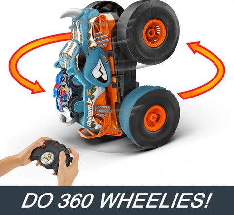 Monster Trucks RC Toy With Transforming Rhinomite doing 360 wheelies with remote control visible, showcasing tank steering action.