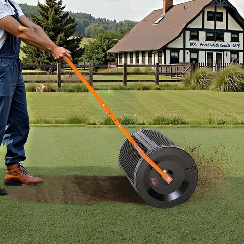 Heavy Duty Compost And Seed Spreader 24 Inch Wide Peat Moss Spreader with T Shaped Handle in use on grass