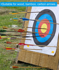 Shield Cut Arrow Vanes 20 Pack 3 Inch Turkey Feather Fletchings on arrows hitting a target during shooting practice
