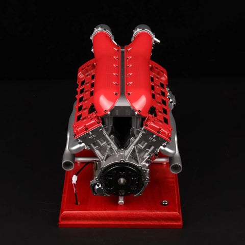 Front view of V12 Engine Model Kit With Over Eight Hundred Metal Parts Motorized Four Stroke Engine Electric Drive DIY STEM Build on red base