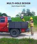 Person setting up 200W Foldable Solar Panel Kit With Stand For Power Stations on a truck, showcasing multi-hole design.