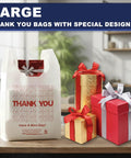 White Thank You Plastic Grocery Bags 11 By 6 By 21 Inches 100 Pack Reusable And Disposable Supermarket Bags for shopping and takeout next to gift boxes
