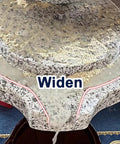 No Fuss Manual Stone Grain Mill With Hand Crank For Dry And Wet Grinding, grain being ground on granite stone surface