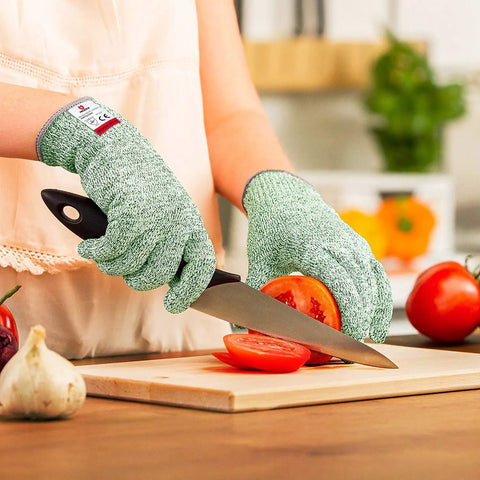 Cut Resistant Gloves Pro Grade Level 5 For Food Prep Ambidextrous And Machine Washable Ultra Comfortable Lightweight With 100 Percent Food Grade Safety Free Ebook Included being used to slice tomatoes