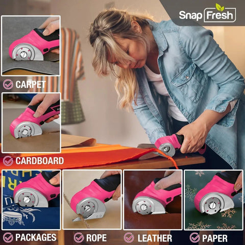 Cordless Electric Scissors For Quick Unpacking And Crafting, cutting fabric and cardboard on a table with ergonomic grip.