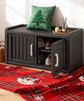 All Weather Outdoor Shoe Storage Cabinet With Two Barn Doors in classic black with Christmas decor and open door showing shoes inside.