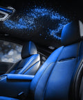 Interior of a car with Starlight Headliner Kit With 300 Fiber Optic Strands, 9.8 Ft Length, RGBW Color Changing Lights on roof.