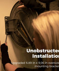 Heavy Duty Double Arm Retractable Air Hose Reel 50 Foot Reach Half Inch Steel Hybrid Core installed on wall with oversized bracket.
