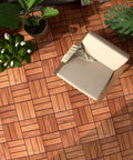 Teak Deck Tiles Interlocking Outdoor Patio Tiles Pack Of Nine, shown with chair on weatherproof hardwood surface.