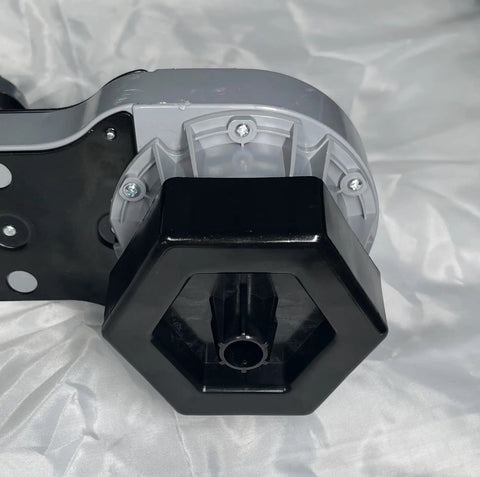 Close-up view of a black hexagonal end of a 12V gearbox and motor from a Pair 12V Gearbox And Motor For Motion T And Action W Left And Right Fits Yamaha Raptor 700R ATV Honda Talon UTV Disney Frozen Sleigh Kids Battery Powered Ride On Toy Car.