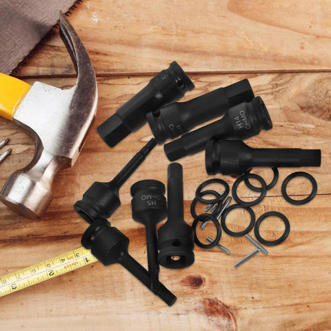 Heavy Duty 1/2 Inch Pneumatic Impact Socket Set With Hex Drive And Deep Thin Wall Design Plus Allen Bits For Fast Automotive Repair Work That Actually Gets The Job Done Right. black impact sockets with hammer, rings, and bits on wood