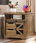Top Shelf Farmhouse End Table With Built In Charging Station And Two Deep Storage Drawers Set Of Two Rock Solid Wood Accent Side Tables Featuring USB Ports And Tidy Cable Routing with flowers and tablet.