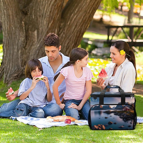 Family enjoying picnic with Leakproof Insulated Picnic Backpack Cooler Bag With 30L Capacity For Beach, Camping, And Outdoor Adventures