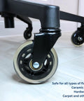 Close-up of installed office chair wheel casters, 3 inch roller blade type, heavy duty, non marking, showing smooth rolling on tile floor.
