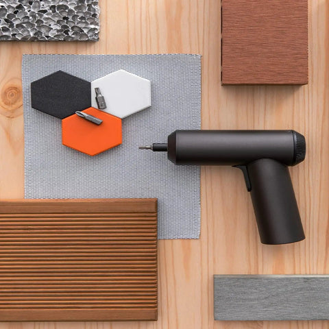 Cordless Screwdriver With USB C Charging, 3.6V 2000mAh Battery, shown with 12 S2 bits on wooden surface