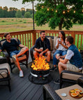 Group enjoying Lit Propane Fire Pit Smokeless 58000 BTU 19 Inch Outdoor Portable Fire Table on patio in evening.