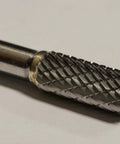 Close-up of Five Sixteenth Inch SA 2 Cylinder Bur Double Cut Solid Carbide tool for precise material removal on metals. Focus on burr head.
