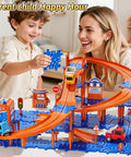 Child and parent playing with 4 Tier Race Track Puzzle Set With 3 Cars For Kids Ages 3 To 8, bright orange multi-layer track.