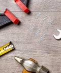 Knock Type Expansion Rivet Kit 130 Pcs M5 Aluminum Core Pop Blind Rivets Set with tools on wooden surface