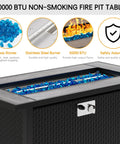 Close-up of 45 Inch Propane Fire Table With 50000 BTU Fire Pit, featuring blue glass stones and stainless steel burner.