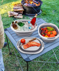Collapsible Wash Basin 7.5L Dish Tub Sink Basin Folding Dish Pan With 2-In-1 Dish Pan And Cutting Board beside campfire