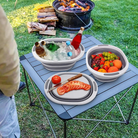 Collapsible Wash Basin 7.5L Dish Tub Sink Basin Folding Dish Pan With 2-In-1 Dish Pan And Cutting Board beside campfire