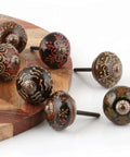 Dope Boho Ceramic Cabinet Knobs Set of 30 Colorful Mandala Knobs with Gold Hardware showcasing intricate designs on wood surface